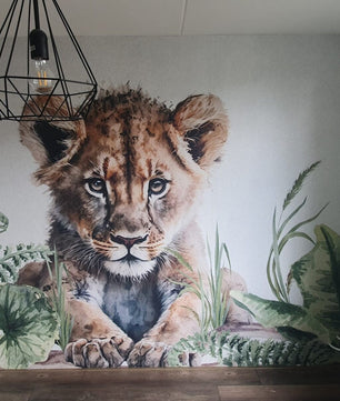 Papel para paredes León joven en la jungla