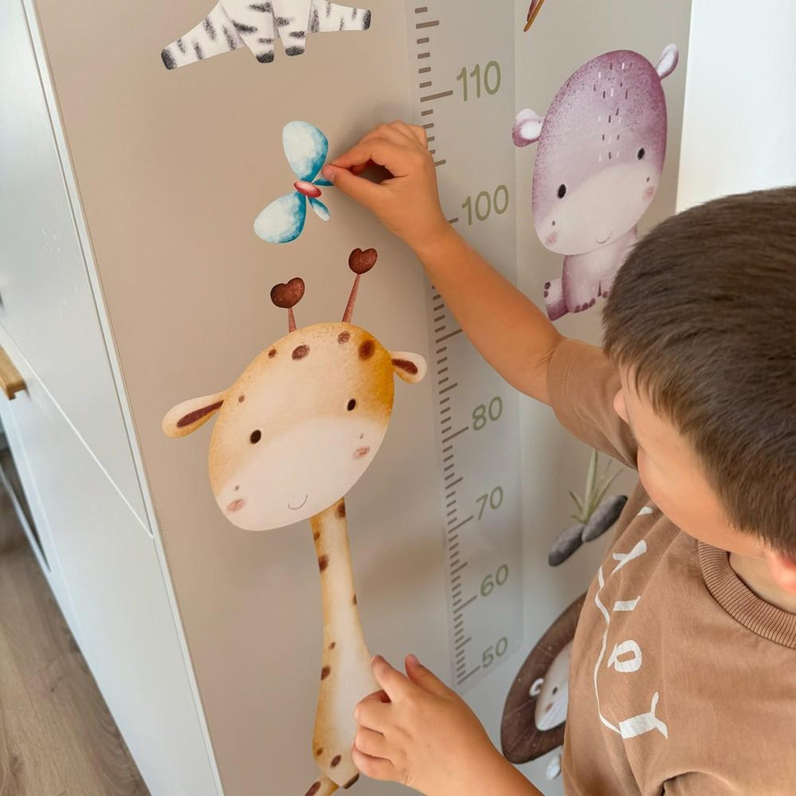 Medidor de altura infantil con animales de safari